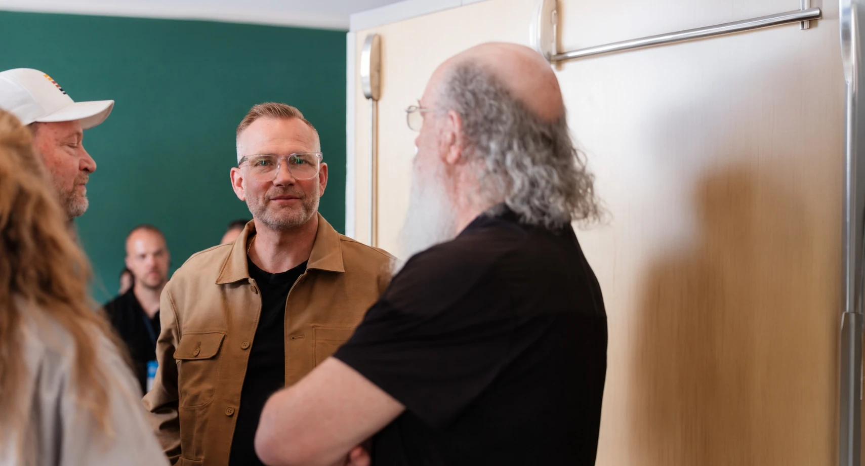 Mark Neal in conversation with leaders after a session